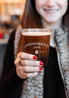 woman with cup of cold brew