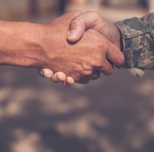 veteran shaking hands